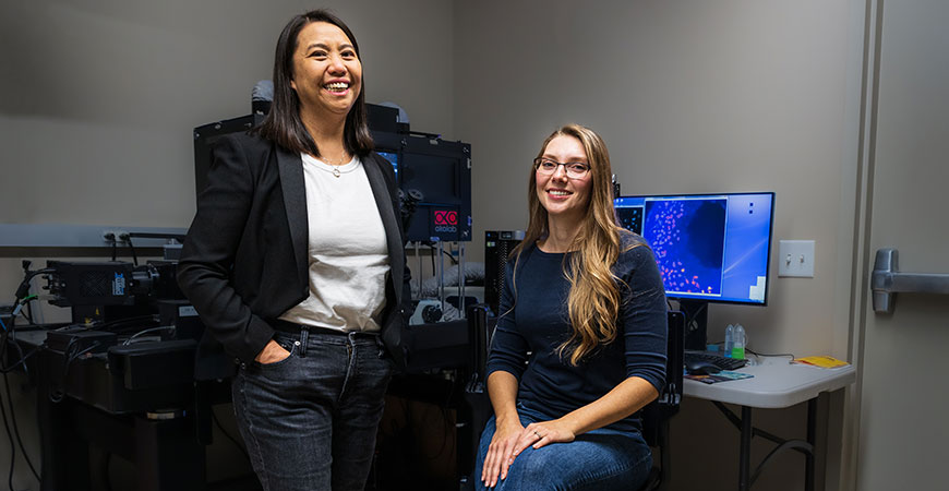 Professor Stephanie Woo, left, and graduate student Leesa Strasser are trying to unlock the mechanics of endodermal cells. Photo by Veronica Adrover, UC Merced.